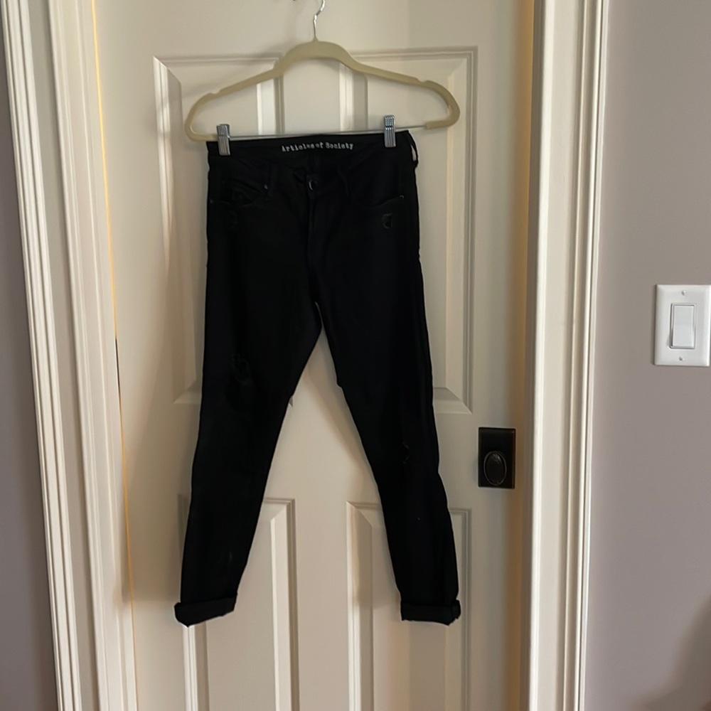 Distressed black denim